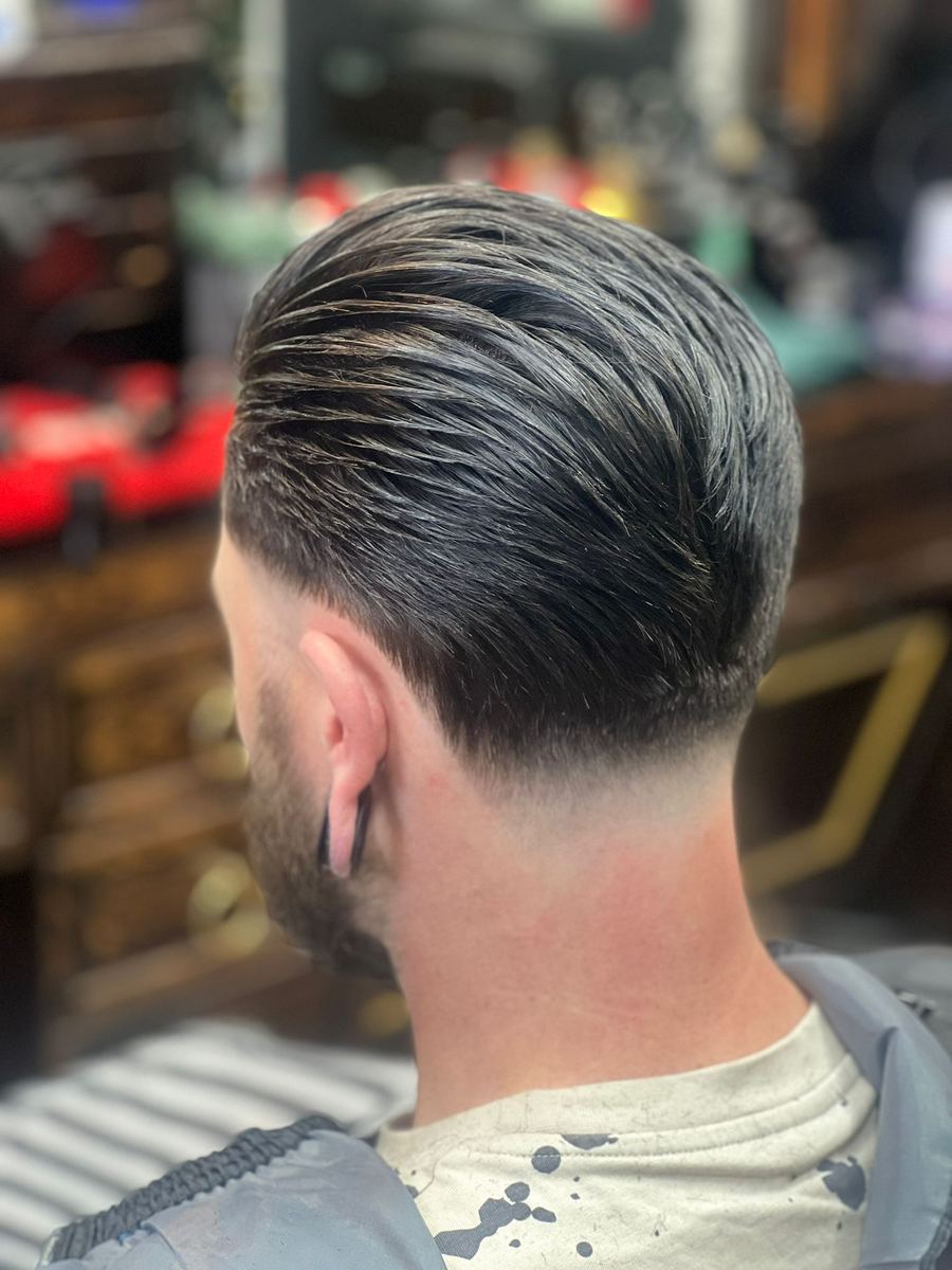 Slick back met low fade